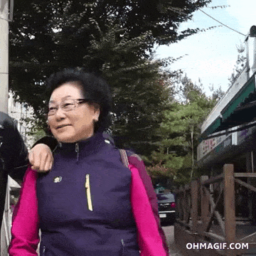 funny-asian-lady-scared-of-black-iron-man.gif